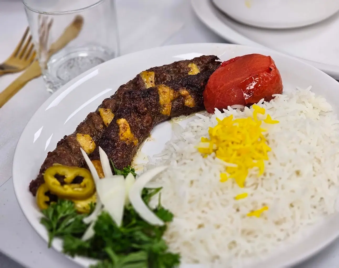 Nik Persian Restaurant signature dishes - Authentic Persian kebabs and stews in Regina